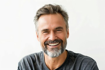 Mature man with a cheerful smile and a stylish beard Portraying confidence and a positive lifestyle on a white background