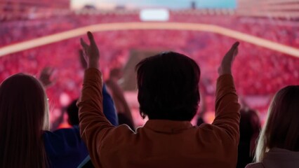 Cheering Soccer Fans Celebrating at a Sports Arena