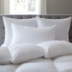 A close-up image of a cozy bed setup featuring soft white pillows and sheets in a well-lit bedroom, exuding comfort and tranquility.