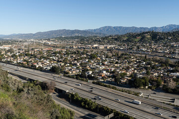 Hilltop view of the Golden State 5 freeway passing through the Elysian Valley and Cypress Park neighborhoods of Los Angeles, California.  