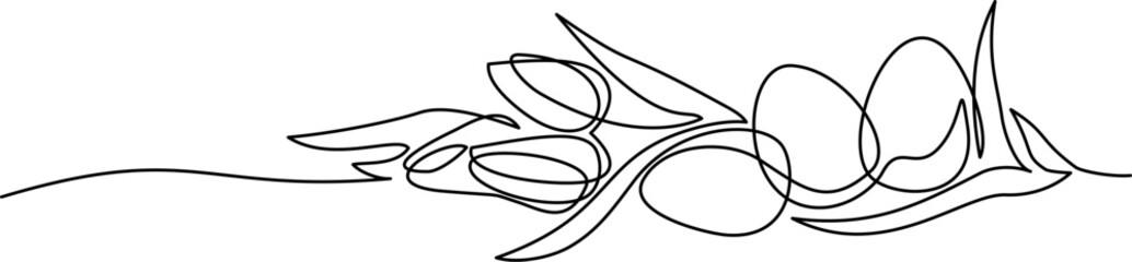 Easter decoration. Holiday eggs with flowers and plant branches.