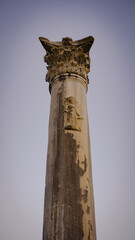 a column with a figure of the goddess Artemis. ancient city of Perge