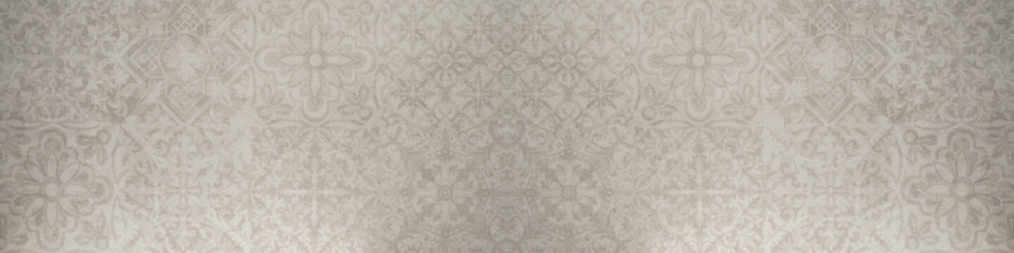 Fototapeta Old gray gray white vintage shabby floral flowers patchwork motif tiles stone concrete cement wall texture background banner wallpaper pattern.