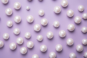 a group of white pearls on a purple background