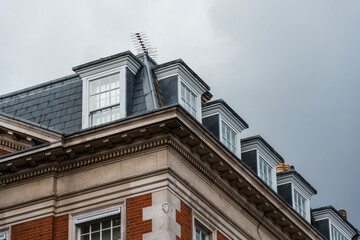 Fototapeta na wymiar Low angle view of old luxury residential building in London