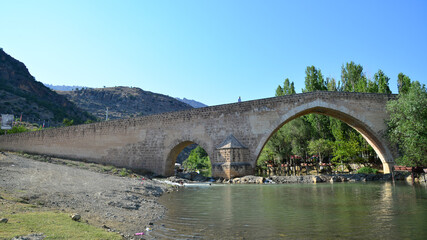 Fototapeta na wymiar Haburman Bridge, located in Cermik, Turkey, was built during the Seljuk period.