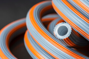 Rubber water hose coiled up, close-up