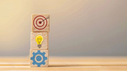 Stacked Wooden Blocks with Icons of a Target, Light Bulb, and Gear on Gradient Background