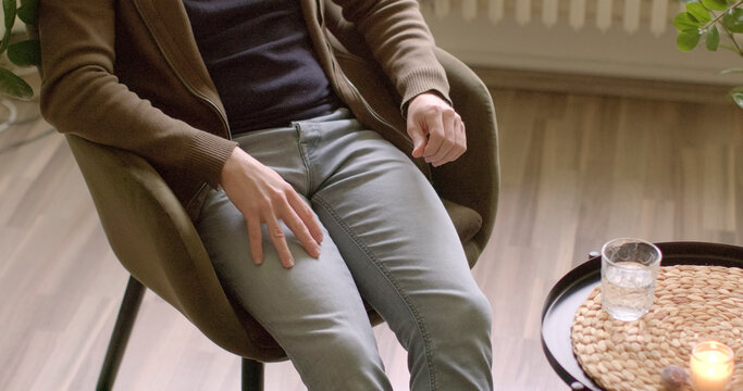 unidentifiable people indoor. Individual counseling session focusing on addiction recovery and overcoming dependencies. Personal therapy addressing addiction issues and journey towards recovery.