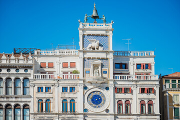 St Mark Clocktower with clock and statues. View from Piazza San Marco, Venice, Italy - 752469160