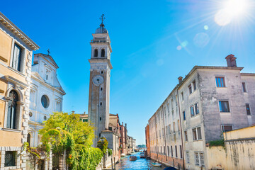 View of campanile of church San Giorgio dei Greci and canal on a sunny day. Venice, Italy - 752469193