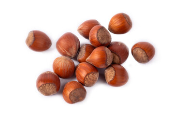 Shelled hazelnuts on the white background