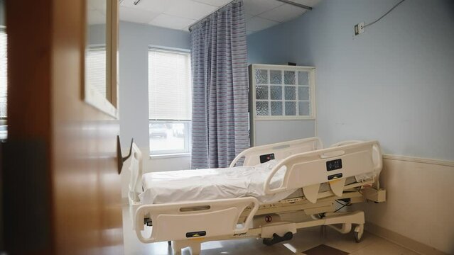 Empty Hospital Bed pan around doorway to reveal