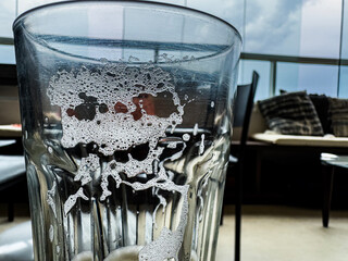 Mystical background. Image of the skull in a glass.
