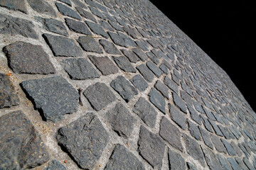 Piso de piedra diversos grises de una calle europea