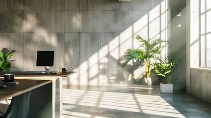 Na biurku znajduje się komputer. Zoom backdrop. Pomieszczenie ma industrialny styl, oświetlone promieniami słońca wpadającymi przez okno. 