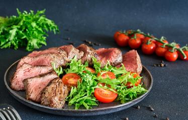 Grilled beef with arugula salad
