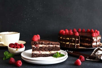 Chocolate cake with vanilla cream and raspberries