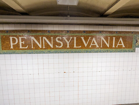 New York, NY - February 20, 2024: Mosaic subway sign for Penn Station in New York
