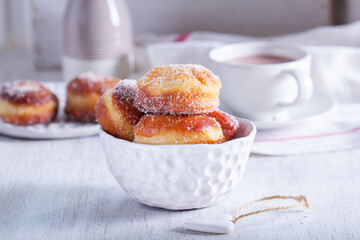 Donuts with sugar and cinnamon served with cocoa. Traditional dessert for Carnival. - 752503935