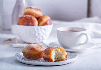 Donuts with sugar and cinnamon served with cocoa. Traditional dessert for Carnival. - 752504123