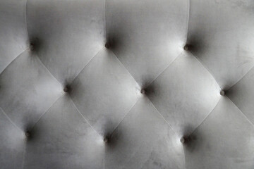soft fabric upholstery with buttons headboard for gray textile background
