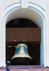 Historic bell on the belfry of the church
