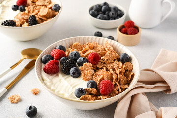 Breakfast with yogurt cereals and berries. - 752521790