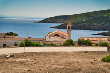 Fototapeta na wymiar Seaside Serenity: Immersing in the Timeless Beauty of Cala Oliva, Asinara's Enchanting Coastal Village, Where Tranquility Meets the Sea