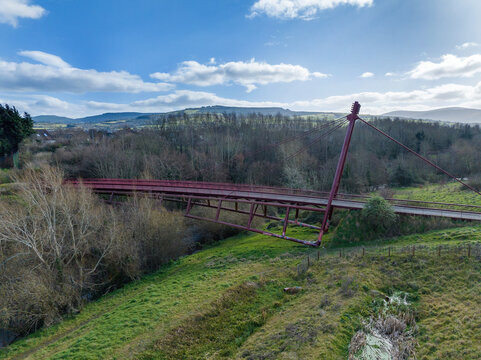 footbridge over the river dodder at dodder riverbank park, dublin, ireland