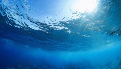 Blue background of ocean water at depth.