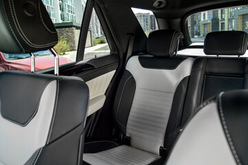 Close-up photo of the interior of a new car, leather seats