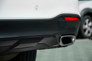 Exhaust pipes of a new car. Close-up