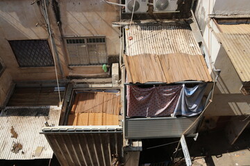 Sukkah for Sukkot from wooden sides and sheets on the street