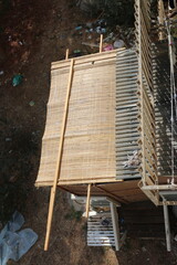 Sukkah for Sukkot from wooden sides and sheets on the street