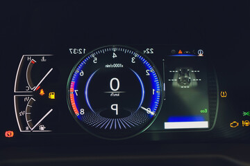 Modern car speedometer of the luxury car. Speedometer and tachometer. Modern dashboard.