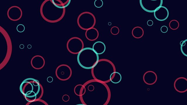 A vibrant spiral of overlapping circles on a black background. The circles, in shades of pink and blue, create a mesmerizing pattern in this colorful image