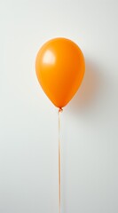 Minimalist Orange Balloon on White Background - Simplicity in Celebration