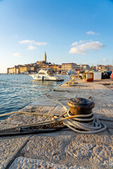 nice view of the sunny city of Rovinj with the adriatic sea from a fishing pier