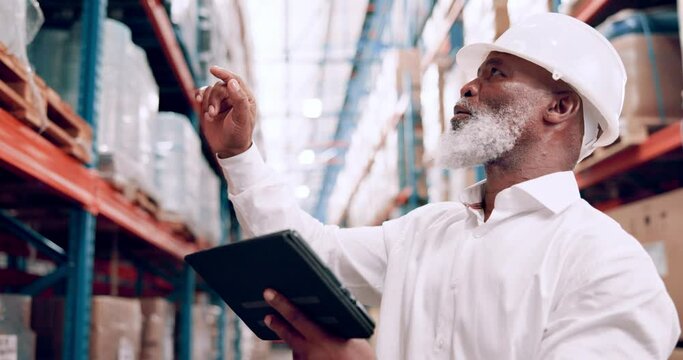Senior, man and tablet in warehouse for inspection, counting stock for logistics and distribution. Digital checklist, African boss with inventory management and storage with tech for supply chain