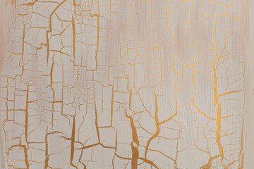 Craquelure scratch texture painting wall background. Gold, bronze, white beige color.