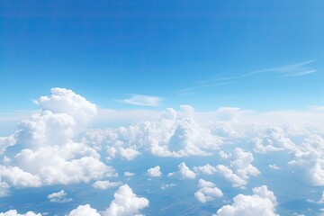 Fluffy White Clouds - A Stunning Aerial View of the Troposphere and Stratosphere Over a Clear Sky, - obrazy, fototapety, plakaty