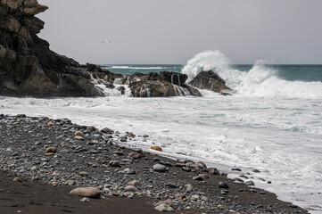 Waves crashing over rocks at Ajuy, Fuerteventura, Spain