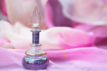 Close up of purple glass perfume bottle vintage style