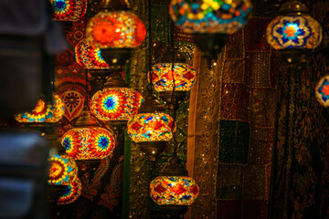 Moroccan or Turkish mosaic lamps and lanterns in shop at Granada, Andalucia, Spain