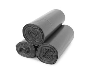 Rolls of black garbage bags isolated on white