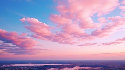 Pink clouds filled the vast sky in a stunning display of natural beauty, turning the sky soft
