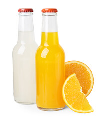 Delicious kombucha in glass bottles and orange isolated on white