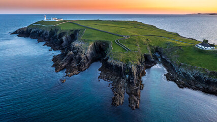 Sunset scene at Galley Head Lighthouse in County Cork Ireland