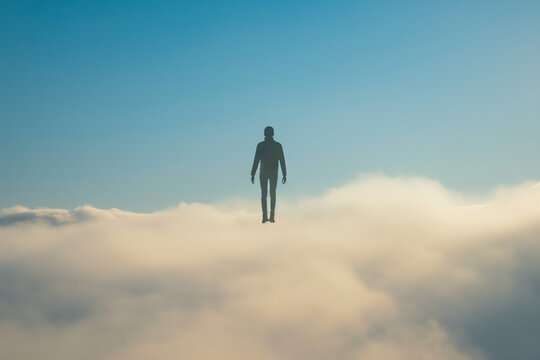 Figure floating in the sky
